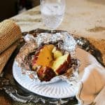 japanese yam in foil on a plate