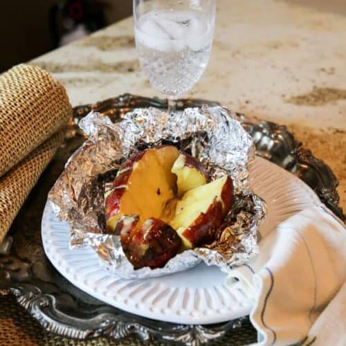 japanese yam in foil on a plate