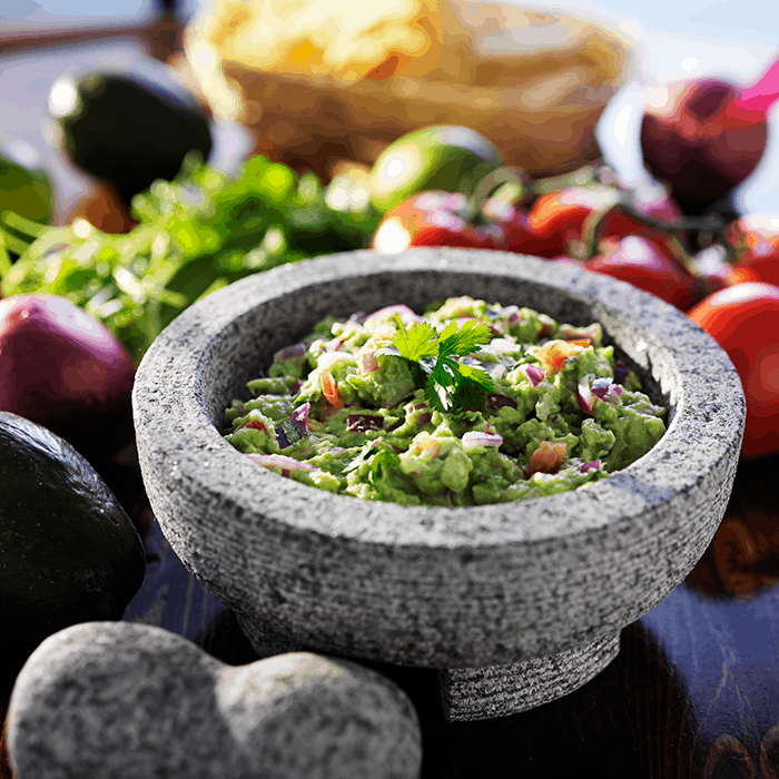 guacamole in a mortar and pestle