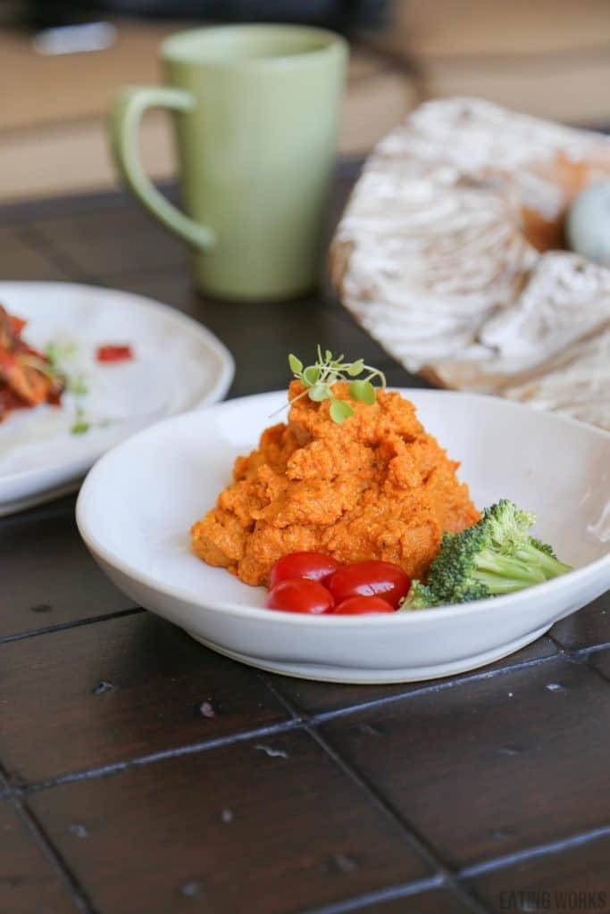 a bowl of carrot hummus 