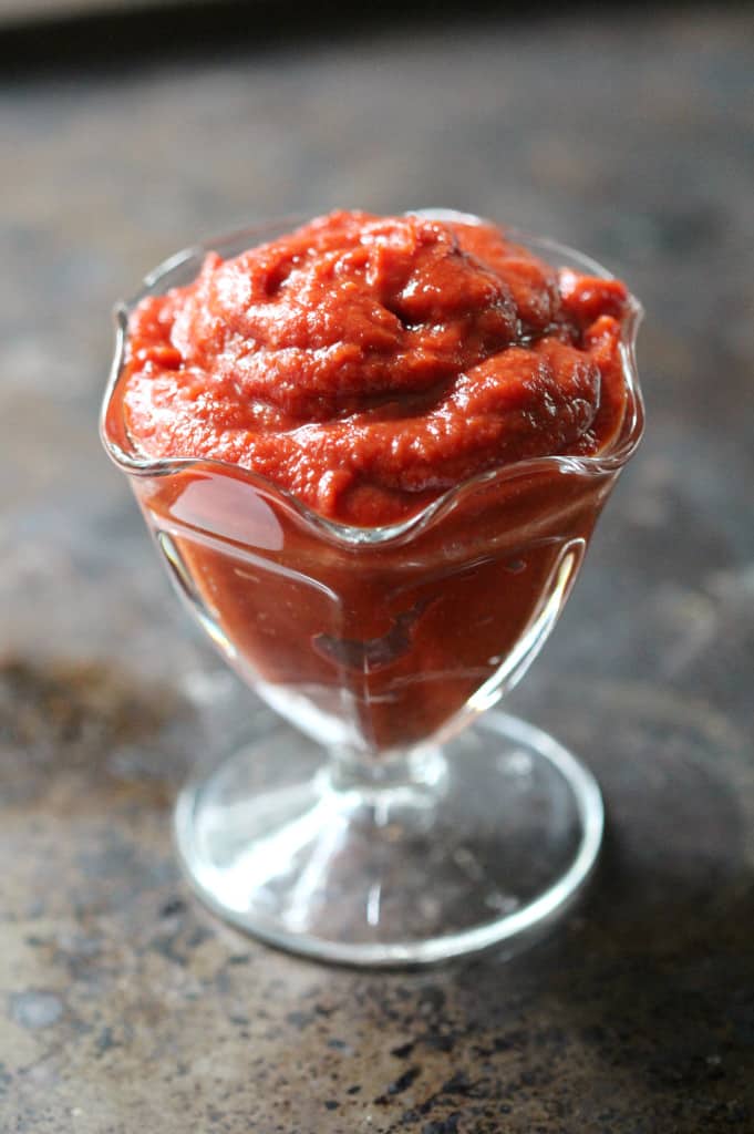 glass jar filled with vegan bbq sauce 