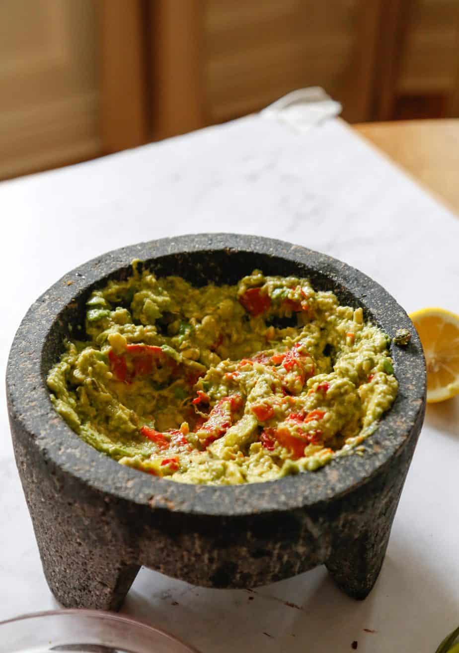 Healthy guacamole in a mortar and pestle