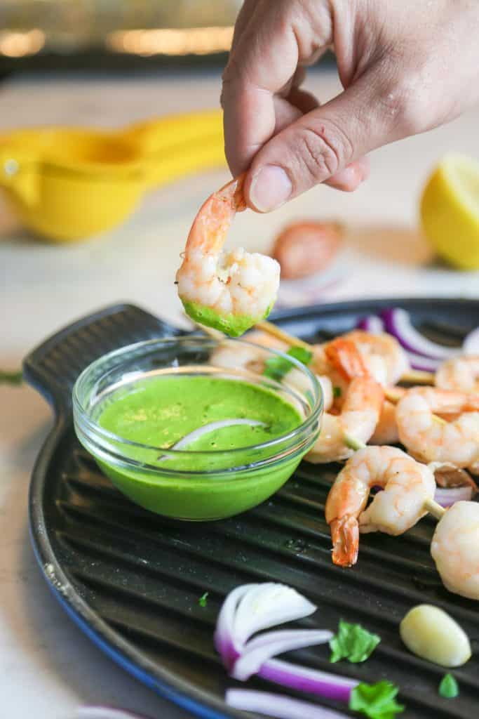 oven baked shrimp kabobs with Vegan Aji Verde Sauce made with garlic tahini lemon juice cilantro parsley shrimp 