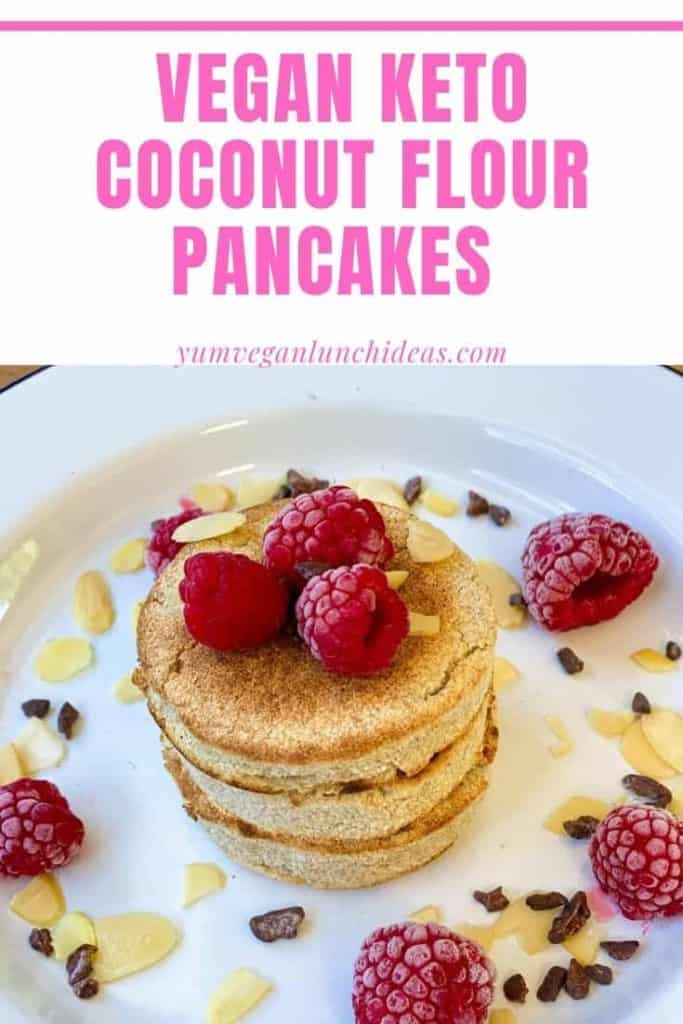 vegan keto coconut pancakes on a plate with raspberries