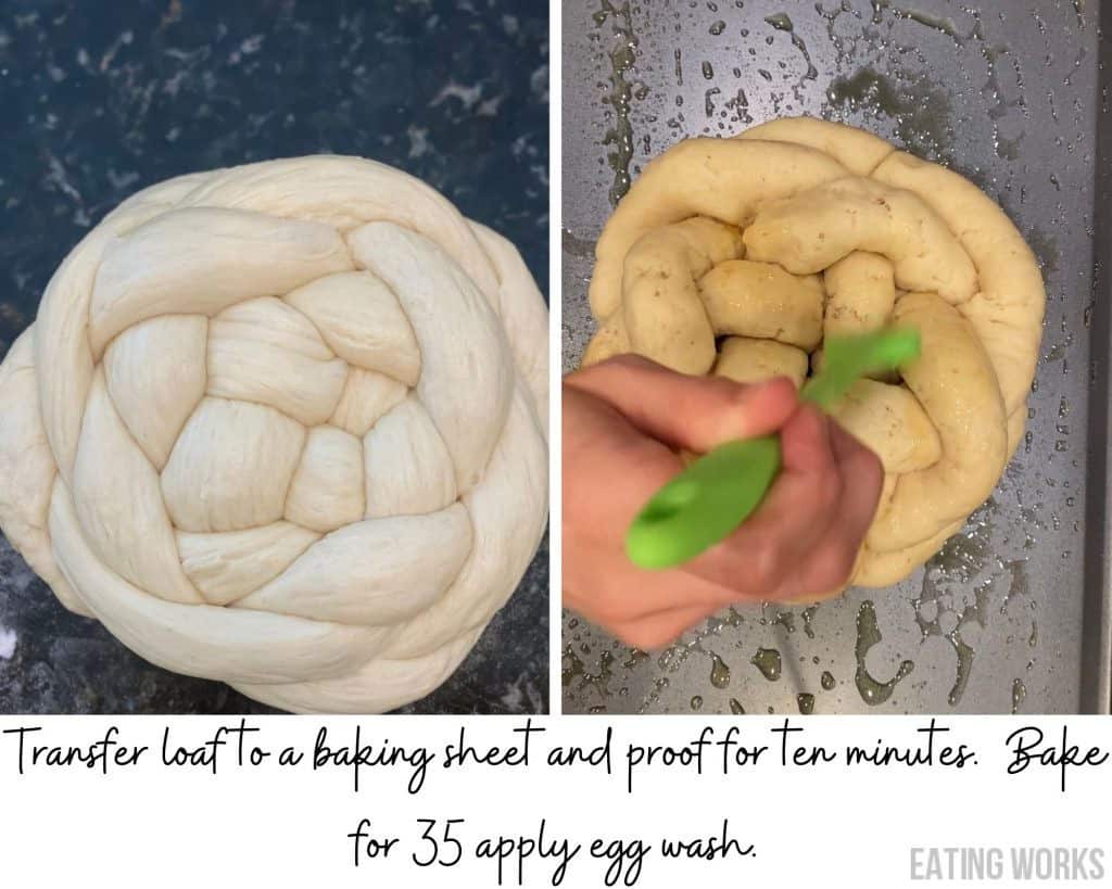 raw round challah on a sheet tray getting an egg wash