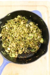 brussels sprouts sauteed in pan for vegetarian stuffed spaghetti squash