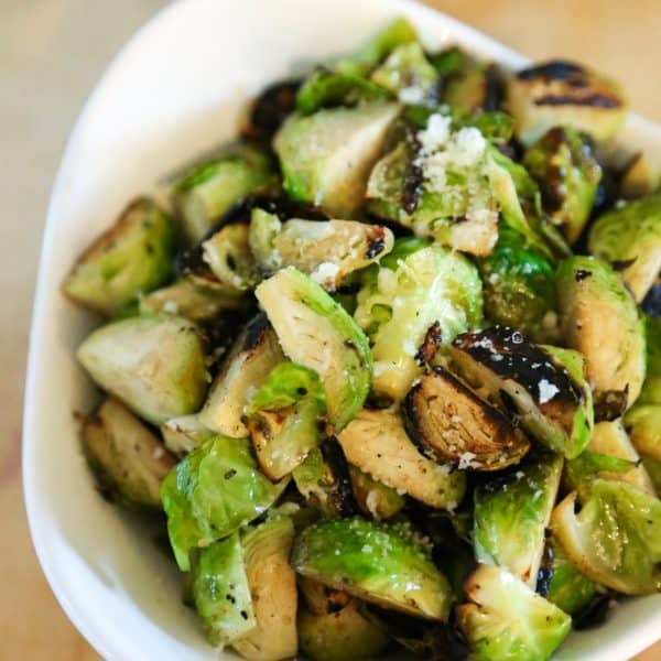 sautéed Brussels sprouts in a white bowl