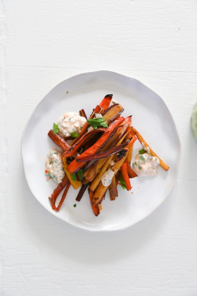photo of rainbow roasted carrots made with Peruvian spice blend