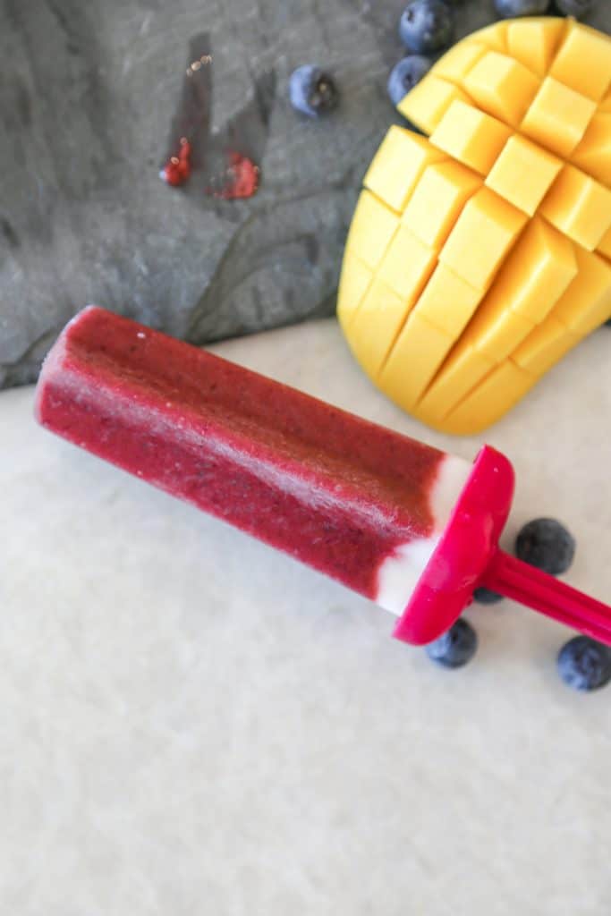 cherry popsicle with mango and blueberry