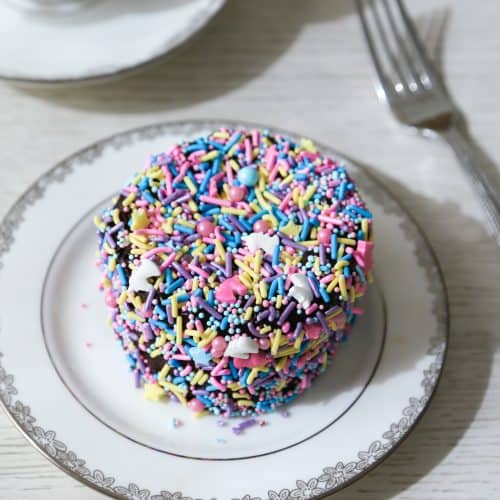 chocolate bento cake on a a plate with a fork