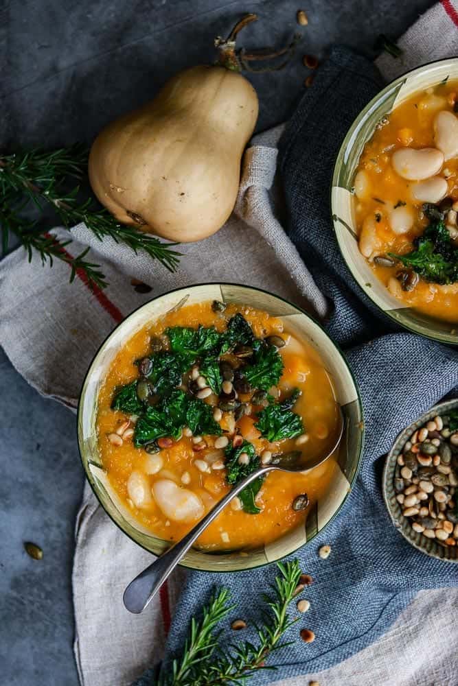 gluten free white bean and butter nut squash soup in a bowl