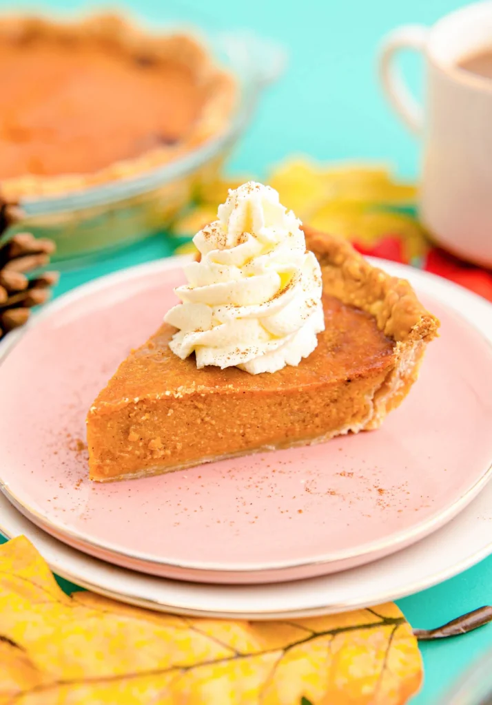 photo of a slice of air fryer pumpkin pie on a plate 