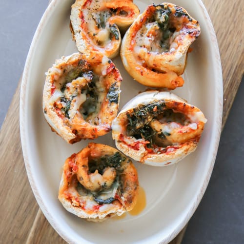 gluten free pizza rolls in a baking dish