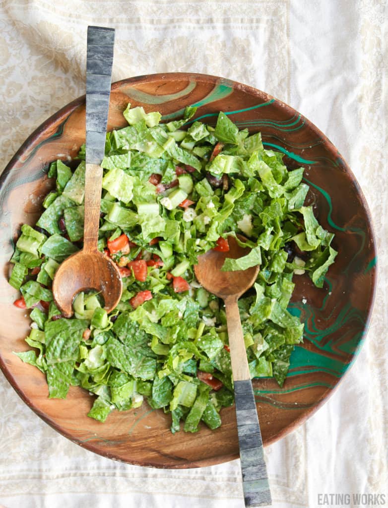 keto greek salad in a wooden bowl