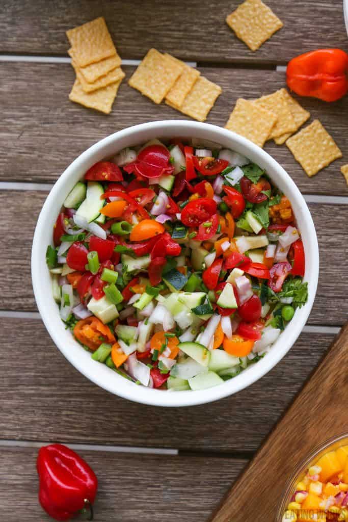 bowl of fresh garden salsa with chips and habanero peppers 