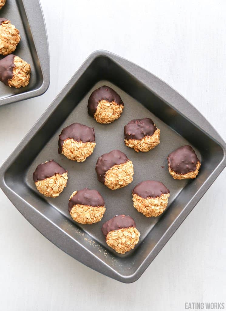 cookie sheet full of no bake pumpkin cookies 