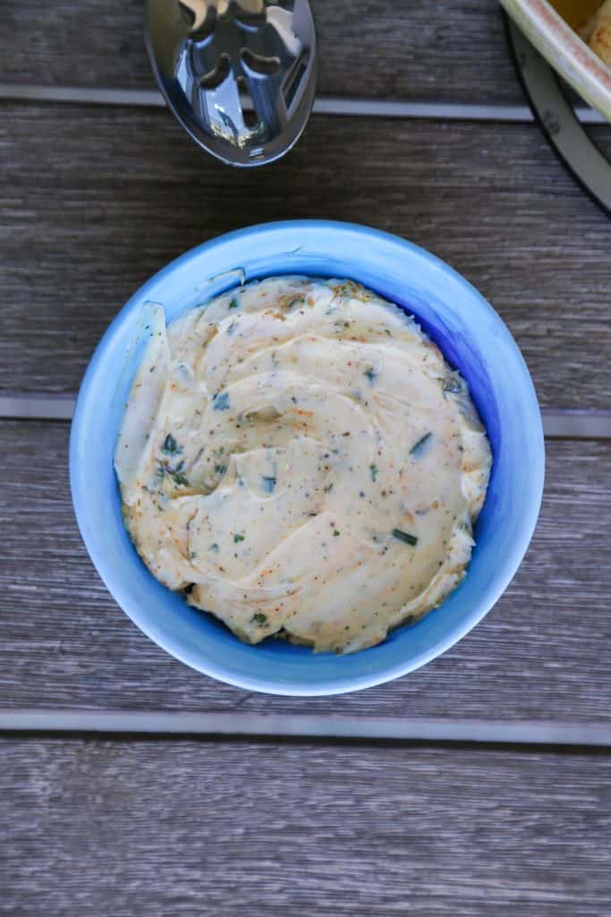 Mediterranean compound butter in a blue dish