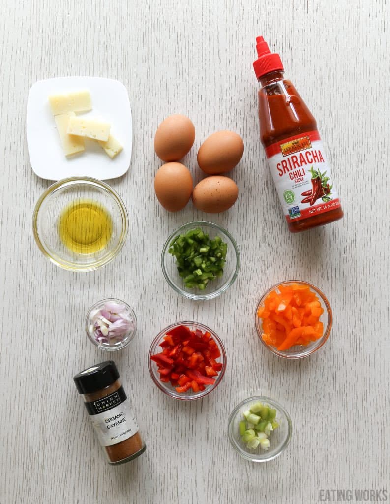 ingredients for spicy omelet eggs, cheese, peppers, cayenne pepper, shallots, jalapeno