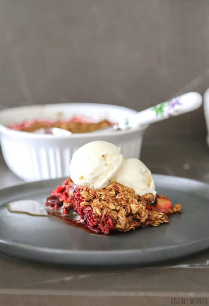 apple and berry cobbler with two scoops of ice cream