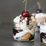 mini cherry tiramisu dessert cup with a cherry on top