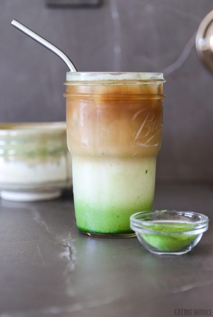 dirty matcha latte with a straw
