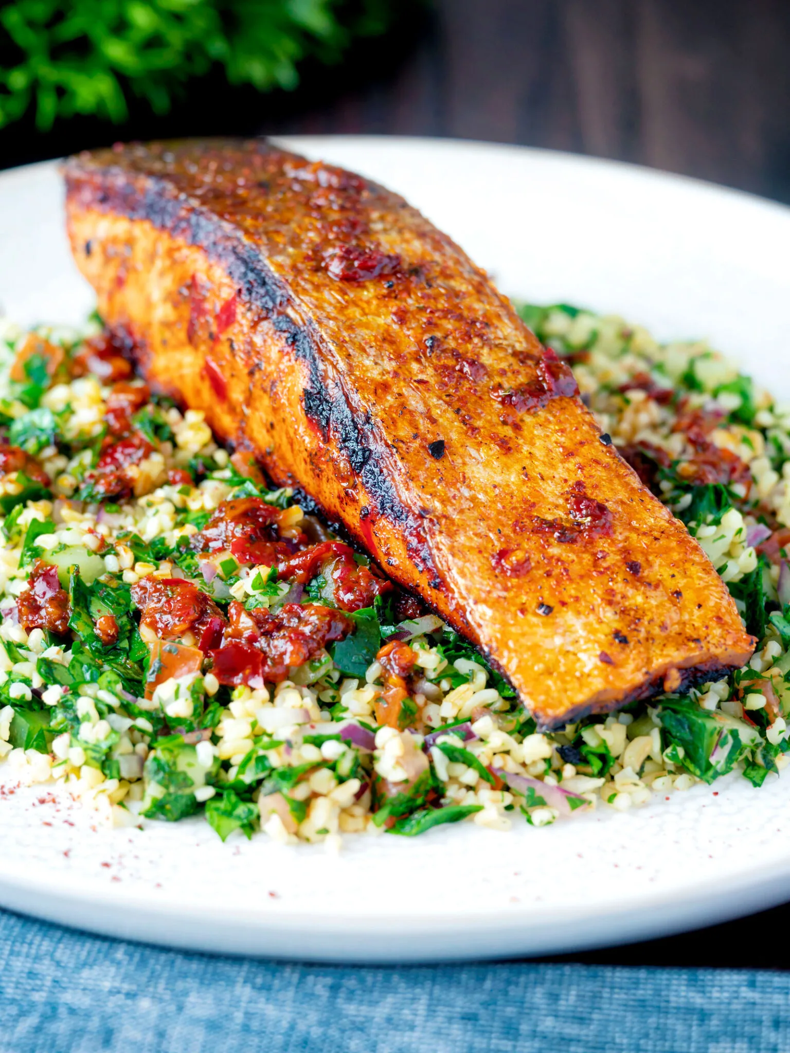 Pan fried harissa salmon fillet served with tabbouleh salad.