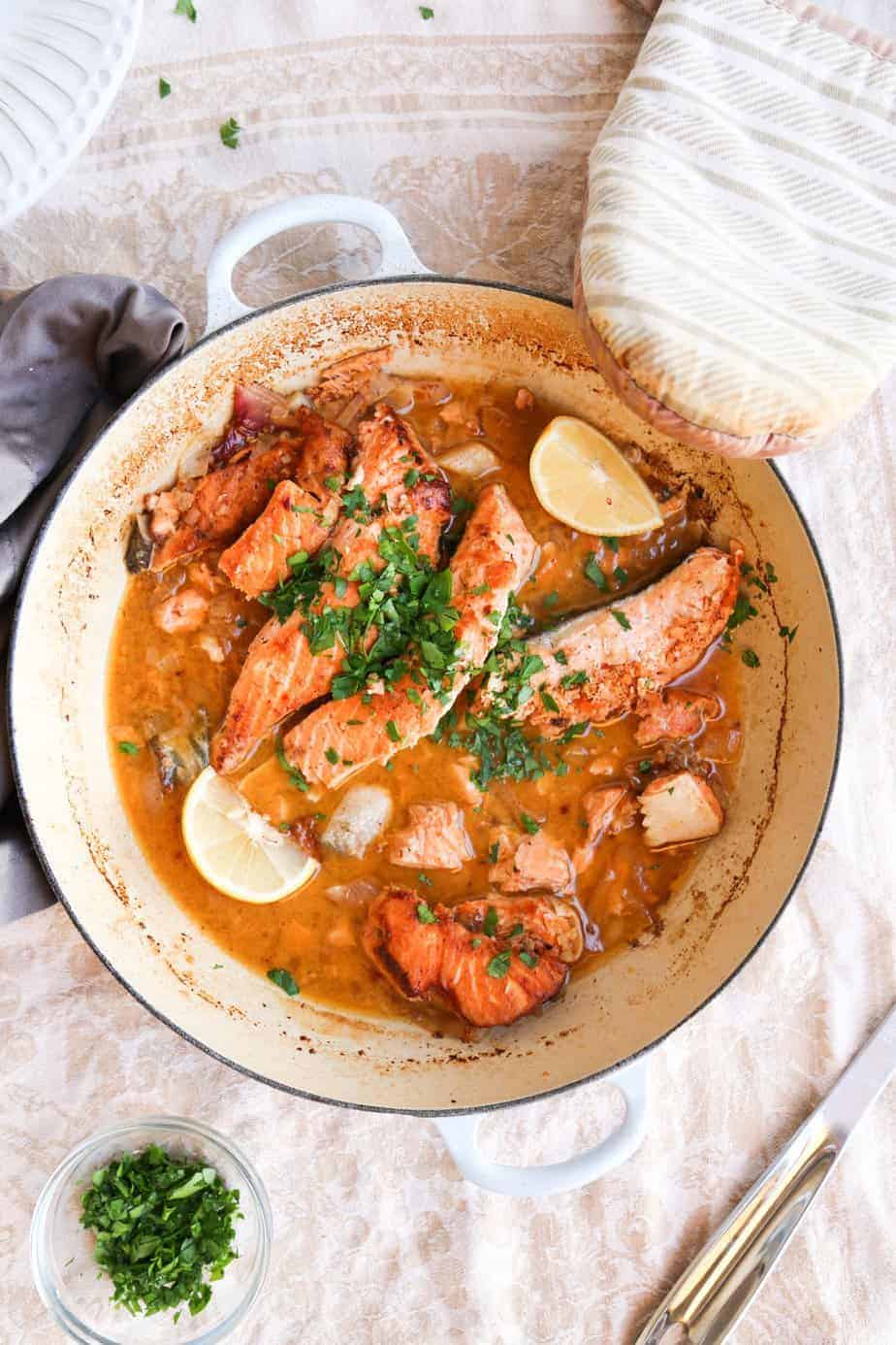 Keto salmon recipe in a pan with parsley.