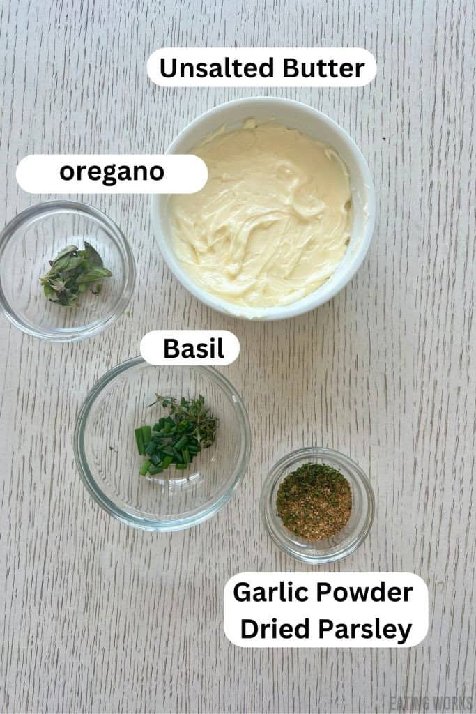 ingredients for greek butter recipe showing greek butter garlic powder, basil, oregano, and dried parsley. 
